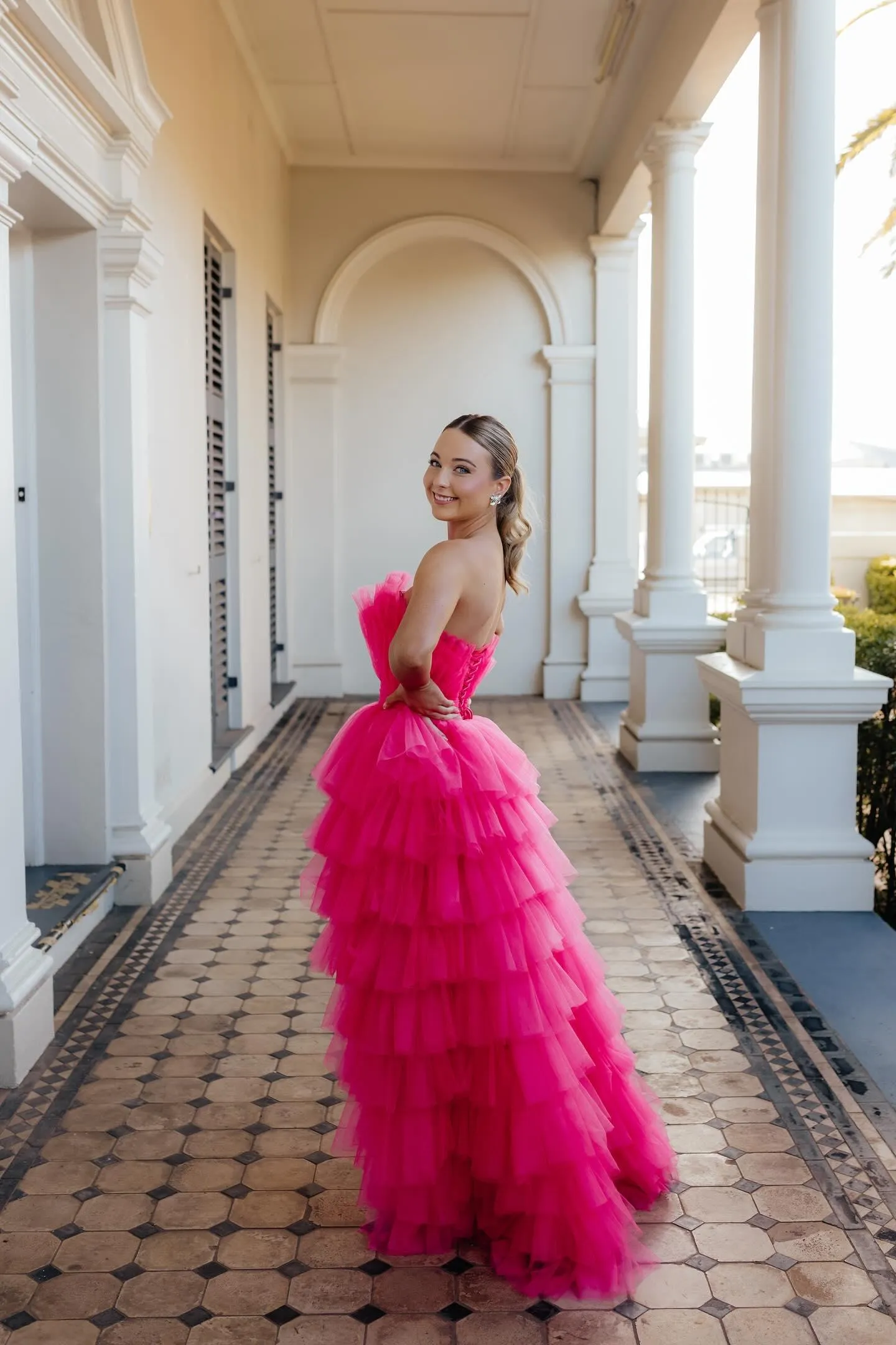 Hot pink hi-low corset tulle-tiered dress